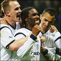 Henrik Pedersen and Youri Djorkaeff mob Bolton goalscorer Jay-Jay Okocha