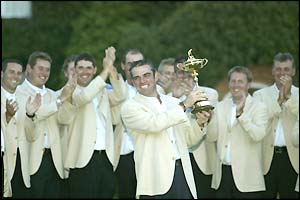 Paul McGinley and the Ryder Cup team celebrate with the trophy