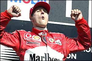 Michael Schumacher celebrates winning the F1 drivers' championship at Hockenheim