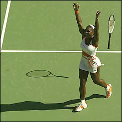 Serena Williams tosses her racket in delight after winning the Australian Open
