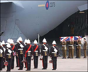 A band from the Royal Marines 3 Commando Brigade led the coffin bearing party