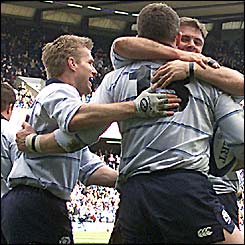 James McLaren celebrates scoring Scotland's second try