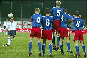 England captain David Beckham curls in a superb free-kick