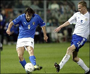 Italian forward Christian Vieri scores against Finland