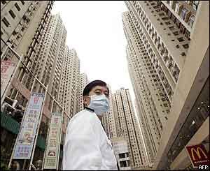 A security guard at Amoy Gardens housing estate in Kowloon bay, Hong Kong 