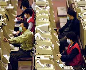 Traders on the Hong Kong stock exchange
