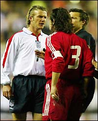 England captain David Beckham has words with Turkey's Bulent