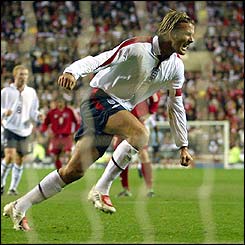 David Beckham celebrates scoring the second goal against Turkey