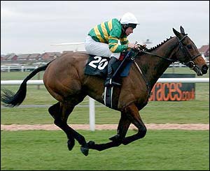 Clan Royal ridden by Lee Cooper comes home to win The Martell Cognac Sainsburys Topham Steeple Chase