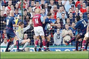 Toure scores an own goal past Arsenal keeper Stuart Taylor