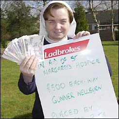 Sister Rita Dawson collects her winnings
