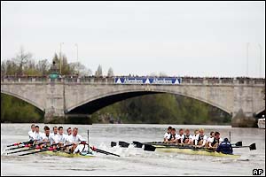 Oxford hold a narrow lead as the crews approach the finish line