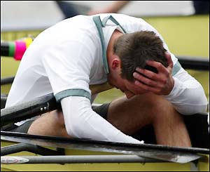 A Cambridge oarsman is dejected when it's announced Oxford have won