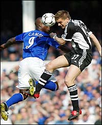 Woodgate is the danger man for Newcastle but his headed shot hits the crossbar