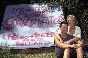 Fans Pedro, left, and Petra Peters from Holland wait outside the entrance to actor Russell Crowe's ranch