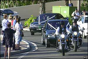 Danielle Spencer's motorcade included Mercedes, police cars and Harley Davidson motorcycles