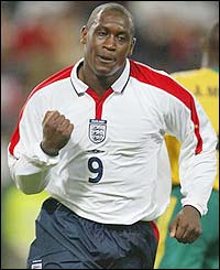 Emile Heskey celebrates scoring the winner against South Africa