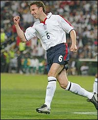 England centre-back Gareth Southgate celebrates scoring against South Africa