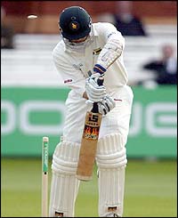 Zimbabwe's Mark Vermeulen is bowled by England's Jimmy Anderson