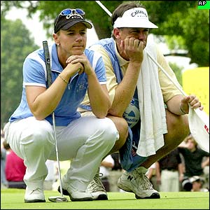 Annika Sorenstam and caddie Terry McNamara look on in disgruntled fashion at a putt for par on the 10th