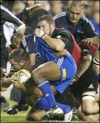 Canterbury Crusaders' Mark Hammett scores the first try of the match in the 18th minute