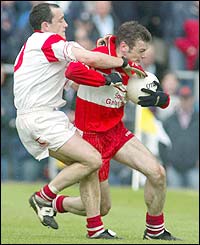 Brian Dooher challenges Paul McFlynn