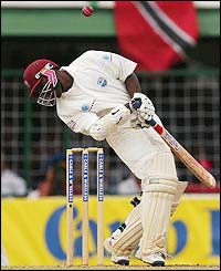 West Indies' Shivnarine Chanderpaul reaches his century