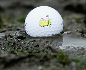 A ball is plugged in the mud at Augusta