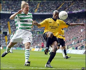 Celtic defender Johan Mjallby closes down Boavista's Duda