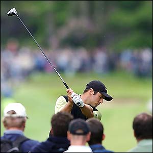 Trevor Immelman plays his tee shot on the third hole at Wentworth