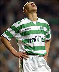 Disappointment for Henrik Larsson as his penalty is saved