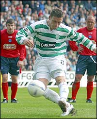 Celtic midfielder Alan Thompson misses a penalty