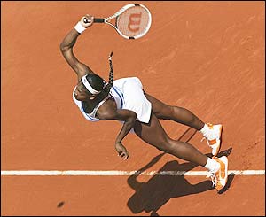 Serena Williams unleashes a serve