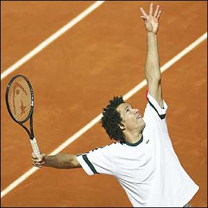 Morocco�s Younes El Aynaoui winds up a serve