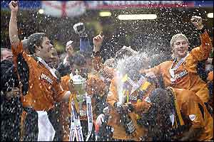 Wolves players celebrate a famous victory in Cardiff