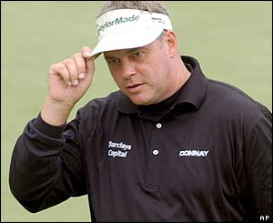 Northern Ireland's Darren Clarke celebrates an eagle at the 15th