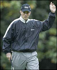 Canada's Mike Weir birdies the second hole