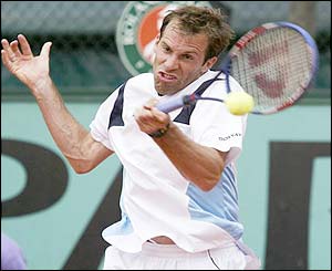 Greg Rusedski hits a forehand return
