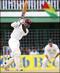 West Indies opener Devon Smith hits a boundary during his innings of 62