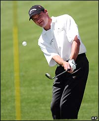 Paul Lawrie hits a shot up to the pin