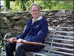 Michael Westmacott in 2003 with the ice axe he used on the 1953 expedition