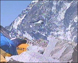 Helicopter approaches Everest Base Camp