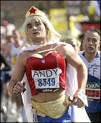 A competitor dressed as Wonderwomen takes part in the marathon