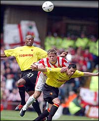 Watford's Marcus Gayle and Micah Hyde battle with Southampton's James Beattie 
