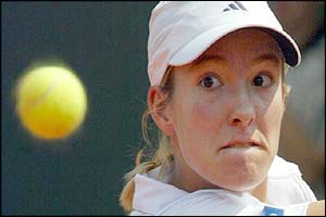 Henin-Hardenne watches the ball come towards her
