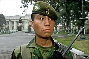 Peruvian soldier stand guards outside the Peruvian Congress