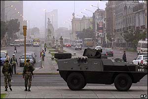 Peruvian army vehicle guards a main street in Lima