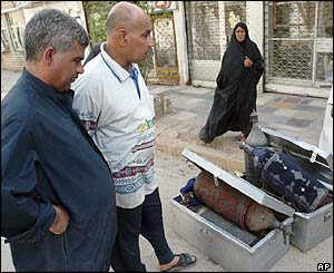 Civilians look at ancient Jewish ark