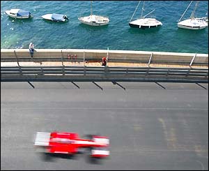 Rubens Barrichello's Ferrari accelerates through the harbour section