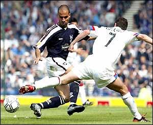 Rangers' Shota Arveladze (left) takes on Jonay Hernandez Santos 